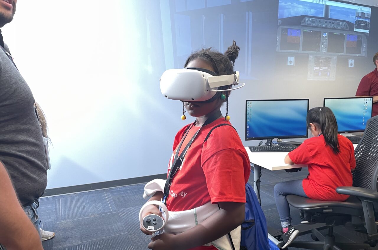 Camper tests our VR training headset at DFW hangar